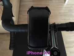 An Apple iPhone XS phone in the BTR silicone bike handlebars phone mount