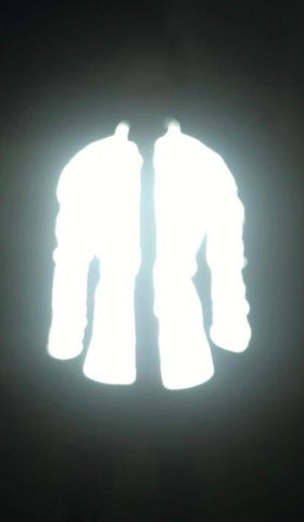 BTR Pink High Vis Reflective Cycling Jacket worn in the evening showing how reflective it is