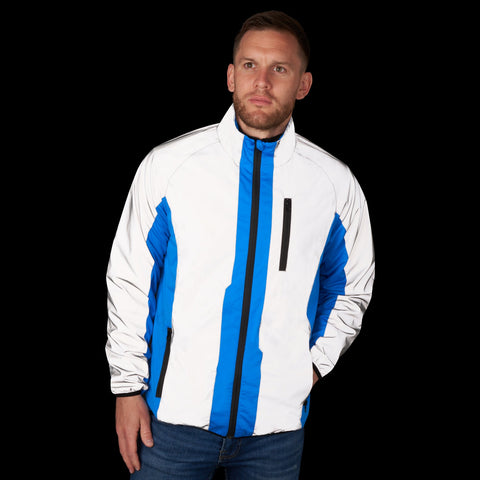 BTR Sports high vis and reflective jacket in royal blue and silver worn by our model in the dark