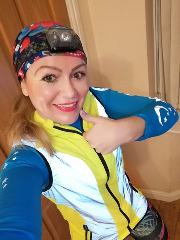 Claire our instagram ambassador wearing our gilet in high vis yellow and reflective from BTR