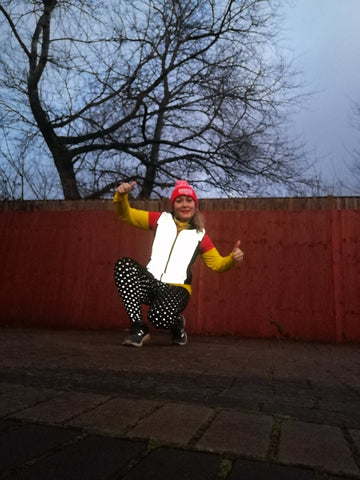 Claire wearing our ladies cut reflective gilet in size 10 - reflect bright in high vis!