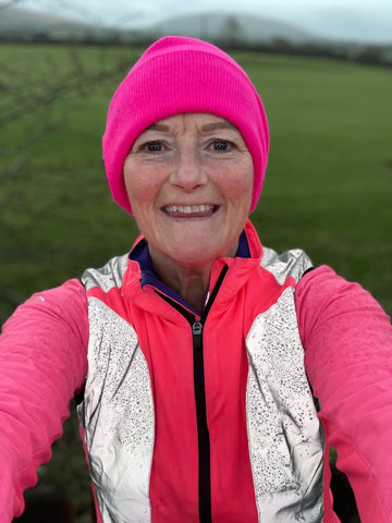 Our BTR Sports customer, Helena, wearing our ladies reflective and pink gilet on a run