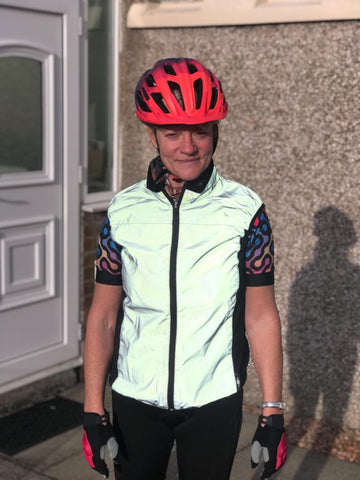 BTR reflective high vis cycling and running gilet being worn in the day by a lady