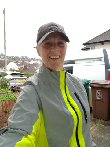 BTR reflective jacket worn in day by female runner