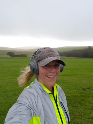 BTR high vis reflective running acket worn by a woman